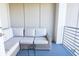 Relaxing balcony with wicker furniture and railing, offering a peaceful outdoor space at 600 48Th Ave. S # 403, North Myrtle Beach, SC 29582