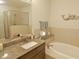 Bathroom features granite vanity, a large soaking tub, and a walk-in shower at 600 48Th Ave. S # 403, North Myrtle Beach, SC 29582