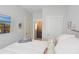 Main bedroom with ensuite bathroom access and calming decor at 600 48Th Ave. S # 403, North Myrtle Beach, SC 29582