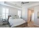 Main bedroom with plush carpet and ceiling fan at 600 48Th Ave. S # 403, North Myrtle Beach, SC 29582
