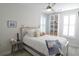 Cozy bedroom with a comfortable bed and built-in shelving at 600 48Th Ave. S # 403, North Myrtle Beach, SC 29582