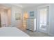 Main bedroom with private access to balcony and en suite bath at 600 48Th Ave. S # 403, North Myrtle Beach, SC 29582