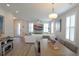 Bright dining area with hardwood floors and kitchen views at 600 48Th Ave. S # 403, North Myrtle Beach, SC 29582