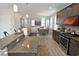 Modern kitchen with breakfast bar and stainless steel appliances at 600 48Th Ave. S # 403, North Myrtle Beach, SC 29582