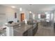 Open concept kitchen features granite countertops and stainless steel appliances at 600 48Th Ave. S # 403, North Myrtle Beach, SC 29582