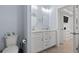 Double vanity bathroom with a marble countertop at 6001 South Kings Hwy., Myrtle Beach, SC 29575