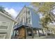 Two-story blue house, elevated with parking at 6001 South Kings Hwy., Myrtle Beach, SC 29575