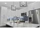 Modern kitchen with stainless steel appliances and marble countertops at 6001 South Kings Hwy., Myrtle Beach, SC 29575