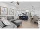 Open concept living space featuring a comfortable sectional sofa and kitchen at 6001 South Kings Hwy., Myrtle Beach, SC 29575