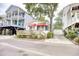 Charming beach house featuring a lovely wooden porch, red awning, and white exterior at 6001-Z16 S Kings Hwy., Myrtle Beach, SC 29575