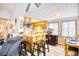 Kitchen with a breakfast bar and seamless access to the adjacent living room at 6001-Z16 S Kings Hwy., Myrtle Beach, SC 29575