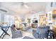 Bright and inviting living room with neutral walls, ceiling fans, and coastal decor at 6001-Z16 S Kings Hwy., Myrtle Beach, SC 29575