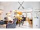 Living area leads to kitchen with breakfast bar seating and dining area at 6001-Z16 S Kings Hwy., Myrtle Beach, SC 29575