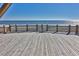 Beautiful ocean view from the wooden deck with a table and seating, perfect for relaxation at 6001-Z16 S Kings Hwy., Myrtle Beach, SC 29575