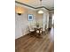 Charming dining area featuring a glass-top table and wicker chairs at 9502 Knights Ct., Myrtle Beach, SC 29572