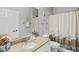 Bathroom with single vanity and tub shower at 1001 World Tour Blvd. # 101A, Myrtle Beach, SC 29579