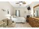 Bedroom with queen bed and wooden dresser at 1001 World Tour Blvd. # 101A, Myrtle Beach, SC 29579