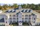 Attractive three-story building with dormers and balconies at 1001 World Tour Blvd. # 101A, Myrtle Beach, SC 29579