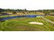 Aerial view of a golf course with water features at 1001 World Tour Blvd. # 101A, Myrtle Beach, SC 29579