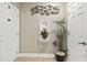Hallway with decorative wall art and potted plants at 1001 World Tour Blvd. # 101A, Myrtle Beach, SC 29579