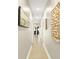 Long hallway with wall art and access to other rooms at 1001 World Tour Blvd. # 101A, Myrtle Beach, SC 29579