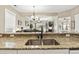Kitchen with granite countertops and double sink at 1001 World Tour Blvd. # 101A, Myrtle Beach, SC 29579