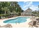 Community pool with lounge chairs and a pergola at 1001 World Tour Blvd. # 101A, Myrtle Beach, SC 29579