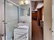 Small bathroom with shower and single sink vanity at 102 Seaview Loop, Pawleys Island, SC 29585