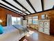 Bedroom with a king bed and ocean views, featuring a dresser and seating area at 102 Seaview Loop, Pawleys Island, SC 29585