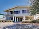 Elevated beach home with spacious deck and walkway at 102 Seaview Loop, Pawleys Island, SC 29585