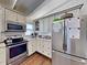 Modern kitchen featuring stainless steel appliances and granite countertops at 102 Seaview Loop, Pawleys Island, SC 29585