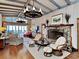 Living area with fireplace and unique lighting at 102 Seaview Loop, Pawleys Island, SC 29585