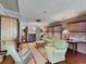 Spacious living room with light-colored furniture and built-in shelving at 102 Seaview Loop, Pawleys Island, SC 29585