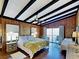 Spacious main bedroom with ocean views, king-size bed and access to a deck at 102 Seaview Loop, Pawleys Island, SC 29585