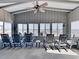 Relaxing sunroom with ocean view and rocking chairs at 102 Seaview Loop, Pawleys Island, SC 29585
