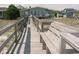 Wooden walkway to beach with benches at 102 Seaview Loop, Pawleys Island, SC 29585