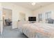 Bedroom with a double bed, carpet flooring, and a TV at 1058 Sea Mountain Hwy. # 1-303, North Myrtle Beach, SC 29582