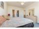 Main bedroom with a double bed, carpet flooring, and ensuite bathroom at 1058 Sea Mountain Hwy. # 1-303, North Myrtle Beach, SC 29582
