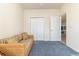 Cozy bonus room features a wicker couch and built-in closet at 1058 Sea Mountain Hwy. # 1-303, North Myrtle Beach, SC 29582