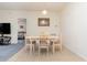Dining area features a light wood table with four chairs at 1058 Sea Mountain Hwy. # 1-303, North Myrtle Beach, SC 29582