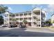 Two-story building with multiple units and parking at 1058 Sea Mountain Hwy. # 1-303, North Myrtle Beach, SC 29582