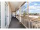 Relaxing screened balcony with outdoor seating and views at 1058 Sea Mountain Hwy. # 1-303, North Myrtle Beach, SC 29582