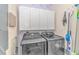 Laundry room with washer, dryer, and ample storage at 1141 Peace Pipe Pl. # 203, Myrtle Beach, SC 29579