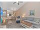 Open and airy living room with a view into the dining area at 1141 Peace Pipe Pl. # 203, Myrtle Beach, SC 29579