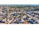An aerial view shows the home near a pond and surrounding neighborhood by the ocean at 1405 Osprey Pointe Ln., North Myrtle Beach, SC 29582