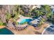 The community pool with a jacuzzi is nestled among trees at 1405 Osprey Pointe Ln., North Myrtle Beach, SC 29582