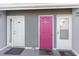 Building entry with three doors and welcome mat at 1880 Colony Dr. # 12-H, Surfside Beach, SC 29575