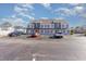 Three-unit building with parking and a well-maintained exterior at 1880 Colony Dr. # 12-H, Surfside Beach, SC 29575