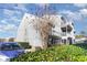 Exterior view of building with landscaping and parking at 1880 Colony Dr. # 12-H, Surfside Beach, SC 29575