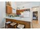 Small kitchen with wood cabinets and a breakfast bar at 1880 Colony Dr. # 12-H, Surfside Beach, SC 29575